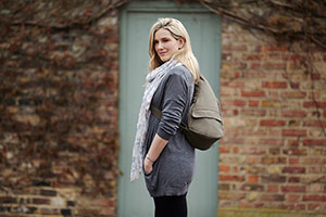 Woman wearing the Healthy Back Bag