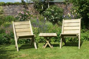 Two wooden garden chairs