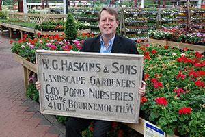 Warren Haskins with Garden Centre sign