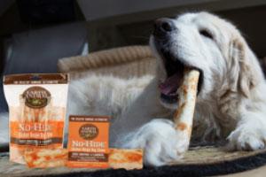 Dog eating No-Hide® Chews - a healthy alternative to rawhide