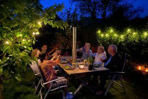 WeGrillTable in a garden setting