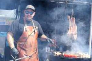 A man cooking on a bbq