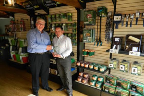 1. Andy Burton (right) receives the ‘Agent of the Year’ award from operations director, Tony Dedman.